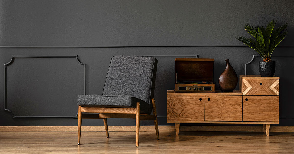 It can be tricky to furnish and decorate a room with dark-colored walls, but when you pull it off, it's well worth it!